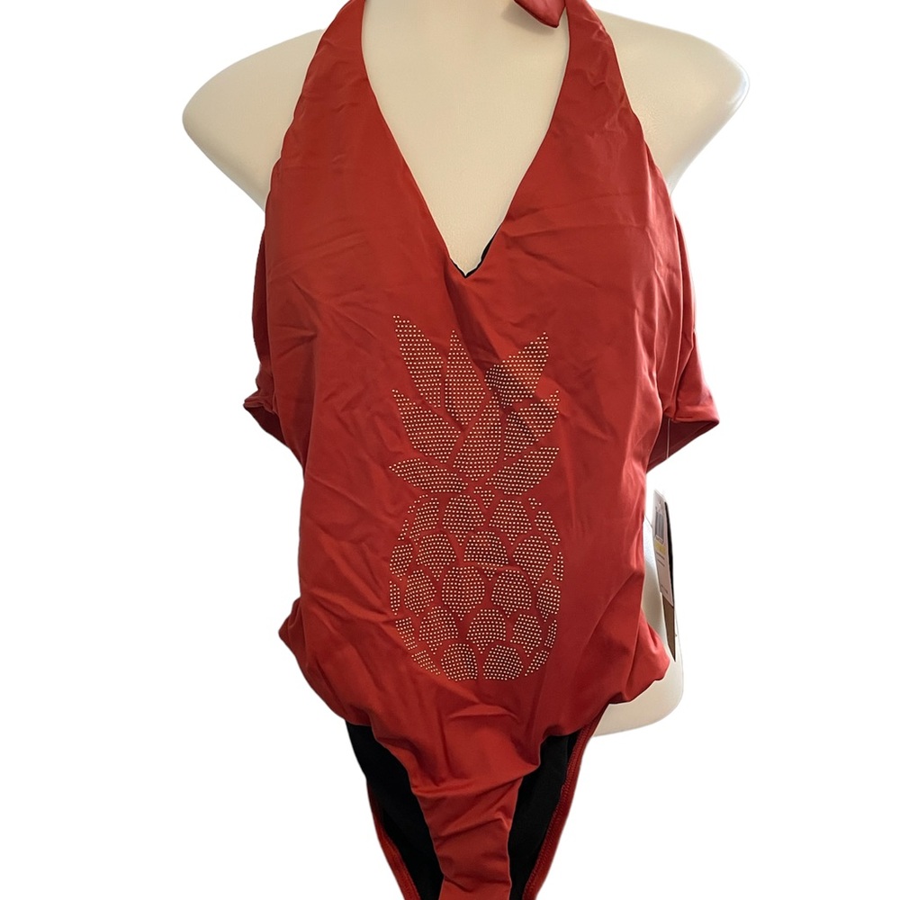 Reef brand pineapple swimsuit brand new with tags . Size medium.